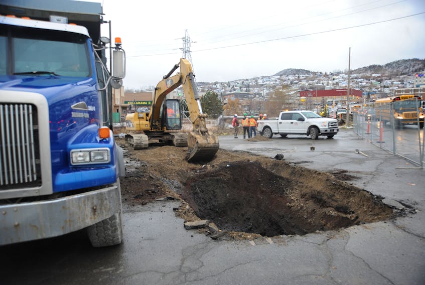 A crew from Marine Contractors began work Monday to realign a water main as part of the the first phase of constructing the new bridge over the Corner Brook Stream on Main Street. Brook Construction will be doing the bridge work itself.