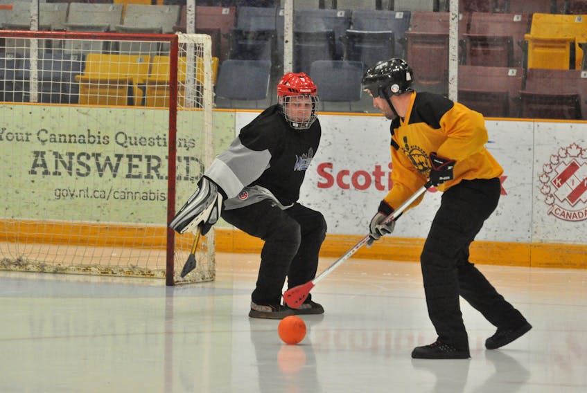 West Side Monarchs’ Chris Bulger, right, had to be surprised to find himself wide open in front of Western Building Products goalie Ian Jones during Game 1 of the Corner Brook Molson Men’s Broomball League best-of-five final on Monday night at the Corner Brook Civic Centre, but he was unable to put the ball past him.