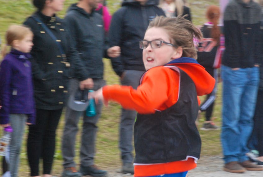 Here, Cole Griffin, a Grade 4 student at J. J. Curling, is seen in full flight at the beginning of the race for Grade 4 male students.