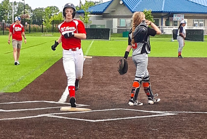 Shilo Chislett crosses home plate for DC Force of Washington, D. C. during a 10-6 win over the Bay Sox in the gold-medal game in the U14 age bracket at the 2018 Baseball for All National Championship.
