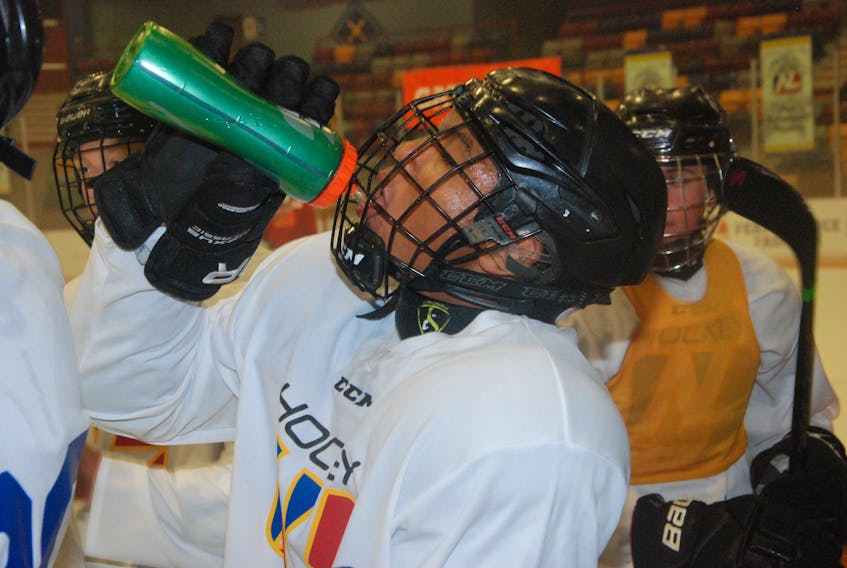 Jonathan Park of Deer Lake takes a drink of water during a break in the action in the 16U male session at the 2018 Hockey Newfoundland and Labrador High Performance Program Camp Wednesday at the Corner Brook Civic Centre.
