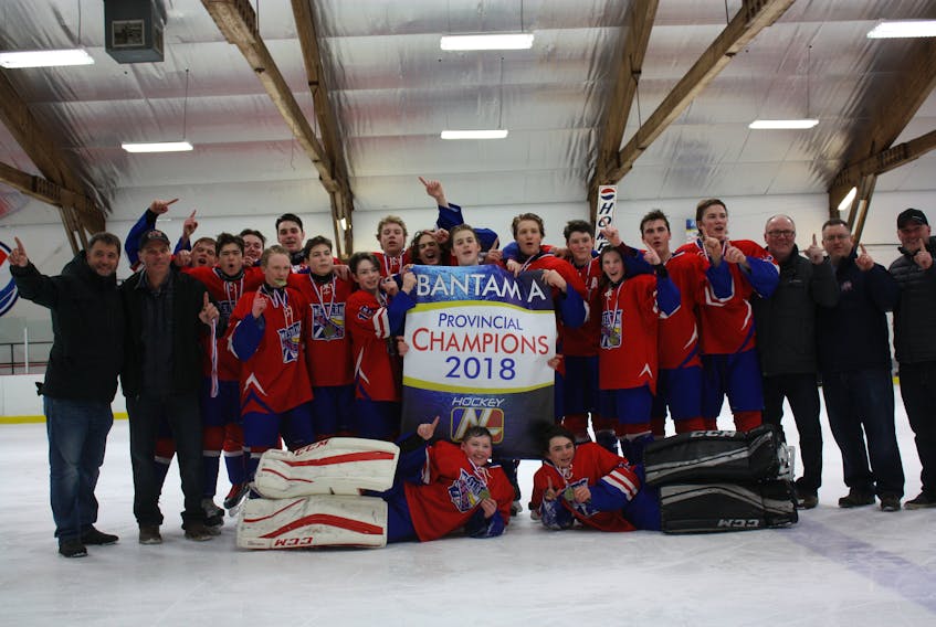 The Corner Brook Royals won the provincial Bantam A hockey banner for the first time in 29 years with a 3-1 victory over the RBC Thrashers in the final showdown at the 2018 HNL Bantam A championship. Team members include, from left (front) Evan Payne and Kaden Reid; (back) coach Sean O'Neill, coach Rob French, Carver Titterington, Adam Ward, Gabe Rogers, Colby House, Mitchell French, Evan Pittman, Michael Normore-Wells, Brad Sheppard, Steven Ford, Jack O'Neill, Nathan King, Ben Smith, Ethan Samson, James Adey, Scott Woolfrey, coach Brian Woolfrey, goaltending coach Brad Payne and manager Matt Rogers.