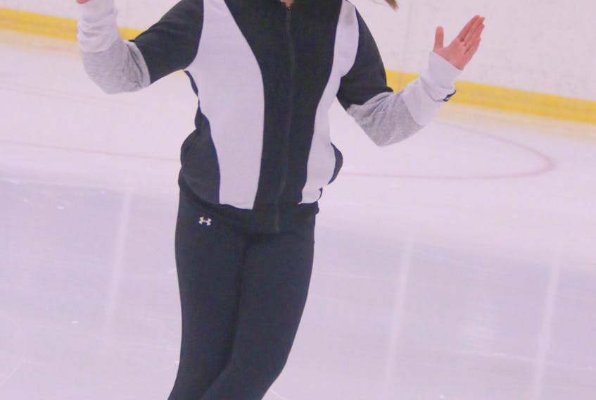 Star 2 skater Lauren Budgell works on her spinning.