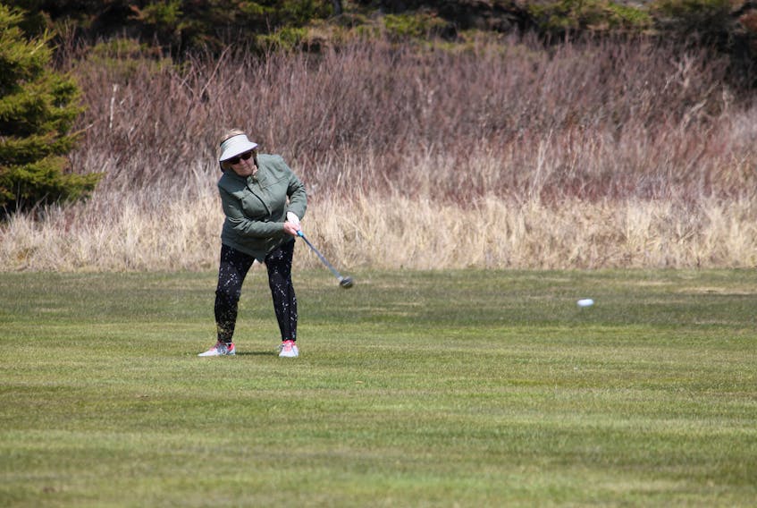 With sunny skies and temperatures in the high teens on Tuesday there were lots of golfers out getting in an early season game at Harmon Seaside Links in Stephenville including Yvonne Healey, a senior member of the club, seen here shooting a ball down a fairway on No. 2 hole. She was out for a round with her senior friend Nora McIntee.