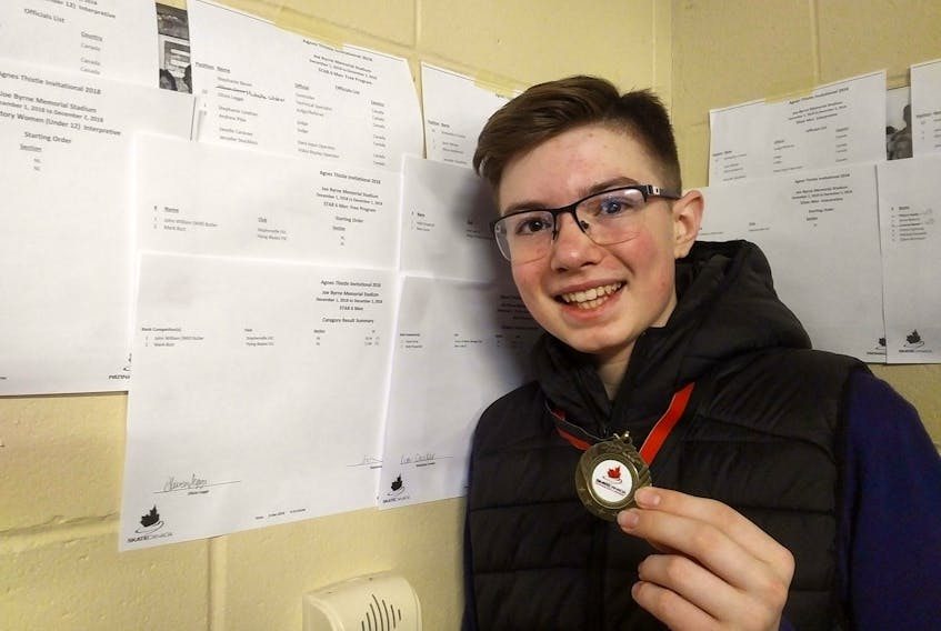 Will Butler poses with his gold medal in the Star 6 men’s category of the 2018 Agnes Thistle Invitational figure skating event in Grand Falls-Windsor.