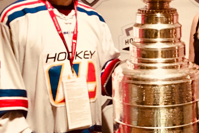 Bruce Keating, chairman for the host committee for 2018 Hockey Day in Canada poses with the Stanley Cup at Marble Mountain during the Music of Hockey with Ron MacLean event held at the Steady Brook ski resort.
