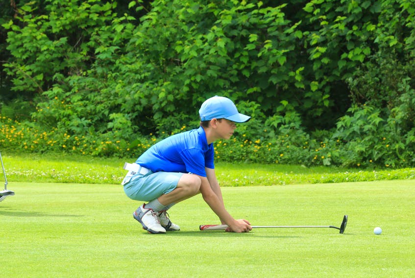 Evan Dicks of Deer Lake lines up a putt on No. 3 during a 2018 Tely Junior Golf Tour stop Thursday at Humber River Course in Deer Lake.
