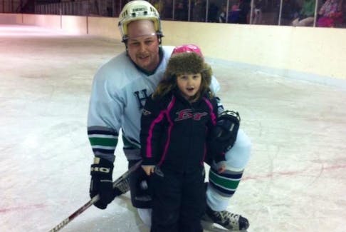 Lance White is shown here with his daughter Cassy during an earlier edition of the Mark Baldwin-Tommy Buffett Memorial Hockey Tournament held in Cox's Cove.