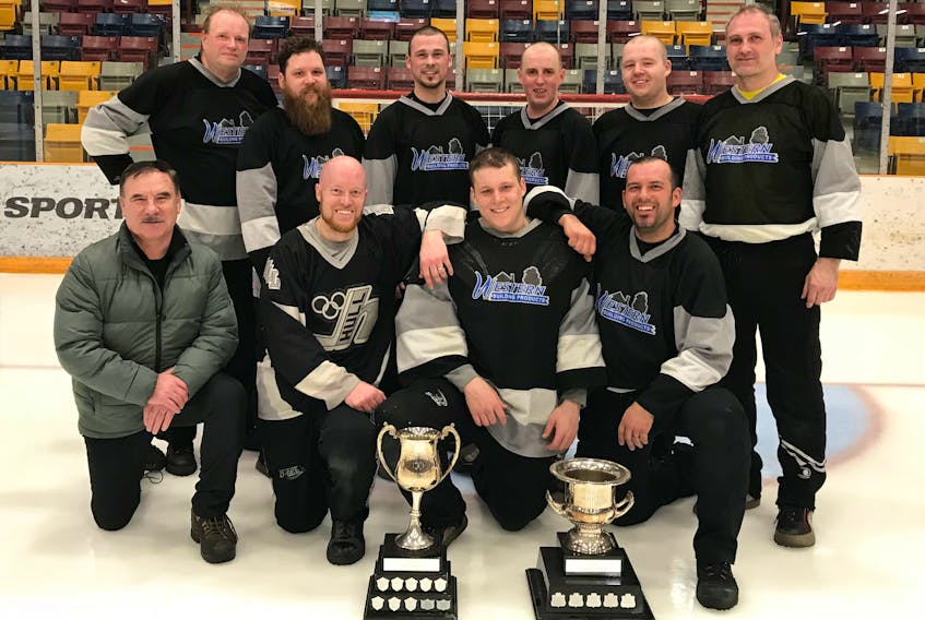 Western Building Products captured the Corner Brook Molson Men's Broomball League championship on Monday night. Members of the winning team include, from left, (front) Kev Mahar, Mike Hawco, Ian Jones, and Lance Ereaut; (back) Martin Mantey, Cory Jones, Paul Prosper, Gordie Scott, Brandon Crewe, and Gary Kean.