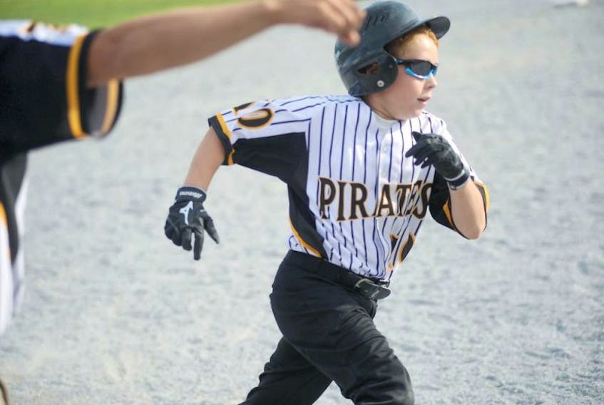 Keegan Deering of the Pasadena Pirates competes in the 2017 mosquito AA baseball championship in this Western Star file photo.