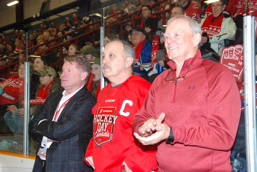 Coaches for Team Lanny McDonald Doug Grant of Corner Brook, right, Bryan Trottier and Glenn Healy had a look of concern on their faces trying to contain the offensive-minded Team Darcy Tucker during the sold out NHL Alumni/Corner Brook Royals Classic Friday night at the Corner Brook Civic Centre.
