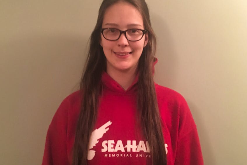 Massey Drive's Hailey Oke believes she grew as a person and a player in her rookie season with the Memorial Sea-Hawks varsity women's volleyball team.
