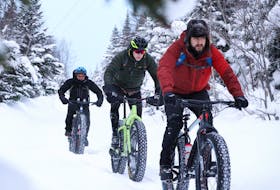 Dave LaRose, leading the pack, and Xavier Campos, left and Billy Newell are seen here enjoying a ride on fatbikes on a snowmobile trail near Corner Brook during the Christmas holidays. LaRose is excited about being provided an opportunity to ride his fat bike on the groomed trail system at Blow Me Down Trails in Corner Brook.