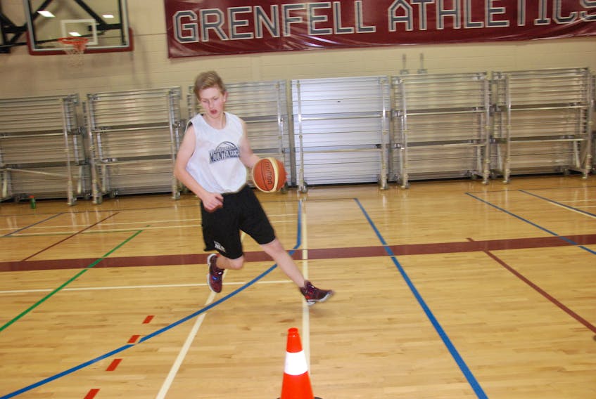 Thomas Hancock of the Humber Valley Mountaineers participates in a drill during a team practice Tuesday night at Grenfell Campus gymnasium.