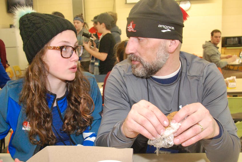 Jillian Coates, a Clarenville native and member of the Eastern nordic ski team, had lunch with her dad and coach Trevor Coates at the Athletes Village Tuesday afternoon.