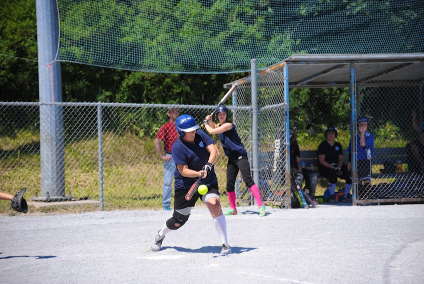 Lori Patey of the KSAB Curling Rangers connects for a base hit up the middle in her Corner Brook team's round-robin game against Impact Signs of St. John's in the 2018 senior ladies provincial fastpitch softball championship played at Fred Basha Memorial Park in Corner Brook this past weekend.