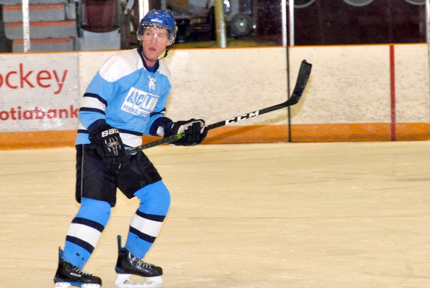 Cyril Walsh in action with AJC Law of the Corner Brook Molson Recreational Hockey League on Tuesday, Dec. 18.
