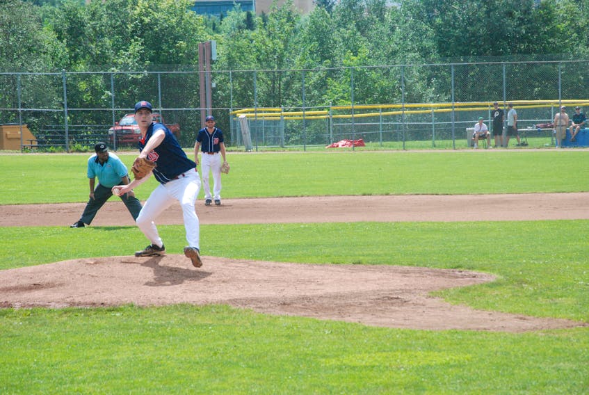 Michael Tavenor delivers a pitch for the Corner Brook Barons in the opening game of the provincial senior A baseball final against the St. John's Capitals. The Barons won the opening game 5-4 in eight innings.