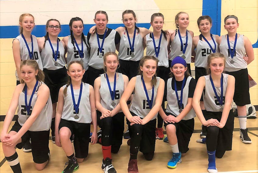 The Corner Brook Intermediate Grade 7 girls basketball team earned a silver medal at the recent NLBA Grade 8 West Provincials last weekend. Members of the team included, from left, (front) Brooklyn Colbourne, Natalie Parsons, Ashley Ricketts, Grace O'Brien, Mary-Jane Jacobs, and Allie Bourne; (back) Kelsey Pennell, Maddie Gale, Olivia Oake, Marissa Matthews, Sylvie LeMoine, Abby Welshman, Emma Mackenzie, Shantel Hurley