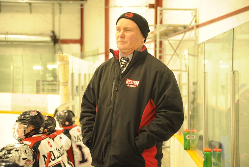 Coach Gerard Morry is shown behind the Western Kings bench during provincial AAA peewee hockey league play last season at the Corner Brook Civic Centre.