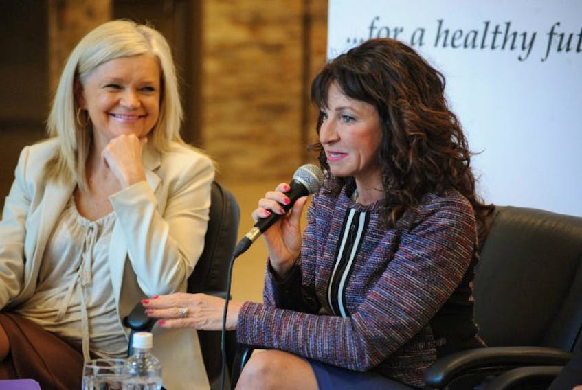 Michelle Melendy, right, who owns a number of car dealerships in Corner Brook, discusses running a successful business during Thursday’s CEO panel discussion. On the left is Charlene Brophy, chief executive officer of the telemedicine company FONEMED.