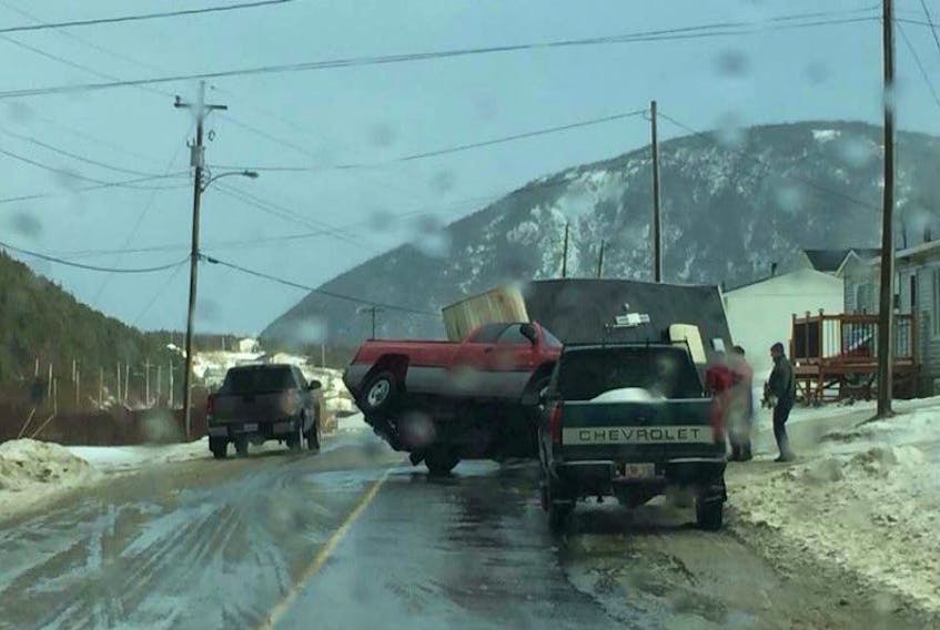 The owner of a pickup truck and trailer saw serious damage to his rig during high winds in Lark Harbour Friday.