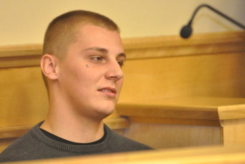 ['Dillon Bourgeois is seen in provincial court in Corner Brook on Tuesday.']
