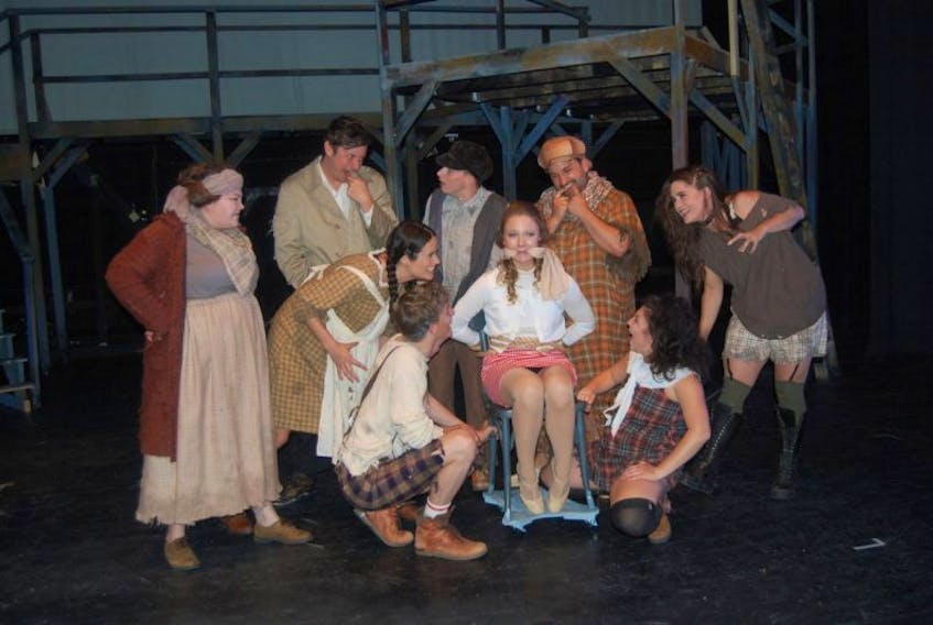 Members of the cast of Urinetown, a mainstage show at the Stephenville Theatre Festival, pose for a photo during a rehearsal early in the season.