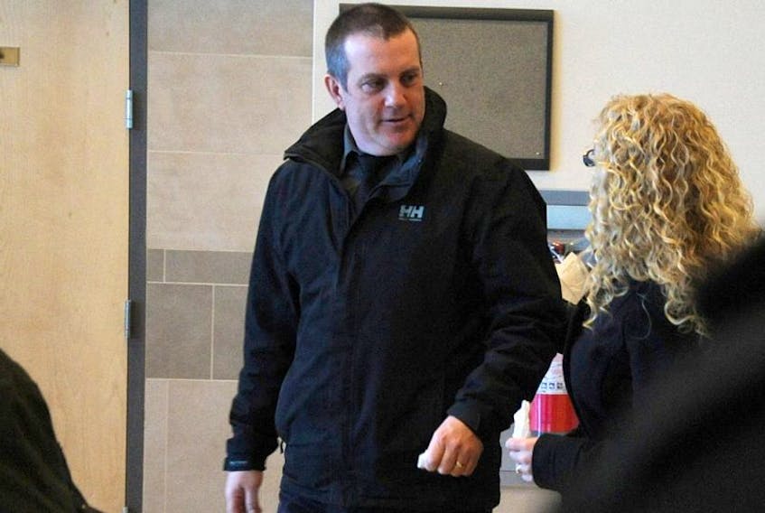 Convicted RNC officer Sean Kelly leaves Corner Brook provincial court in this file photo.