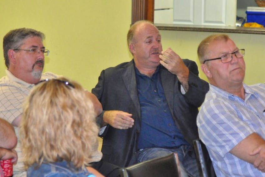 City council hopeful Vaughn Granter, second from right, speaks during the councillor’s forum hosted by the Corner Brook Firefighters at Club 64 on Wednesday night. Also pictured are, from left, council candidates Lenny Benoit, Pamela Gill, and incumbent Tony Buckle.