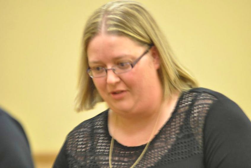 Paula Harvey leaves Newfoundland Supreme Court in Corner Brook on Monday.