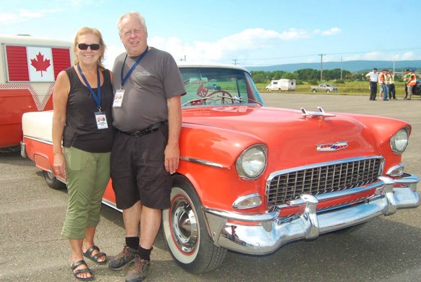 Elaine and Ed Bannister of Meadows had the only entry from Western Newfoundland to take part in the Canadian Coasters 50th Anniversary tour across Canada. Here, they pose for a photo by their 1955 Chevy and their trailer in tow during their stop in Stephenville on Friday.