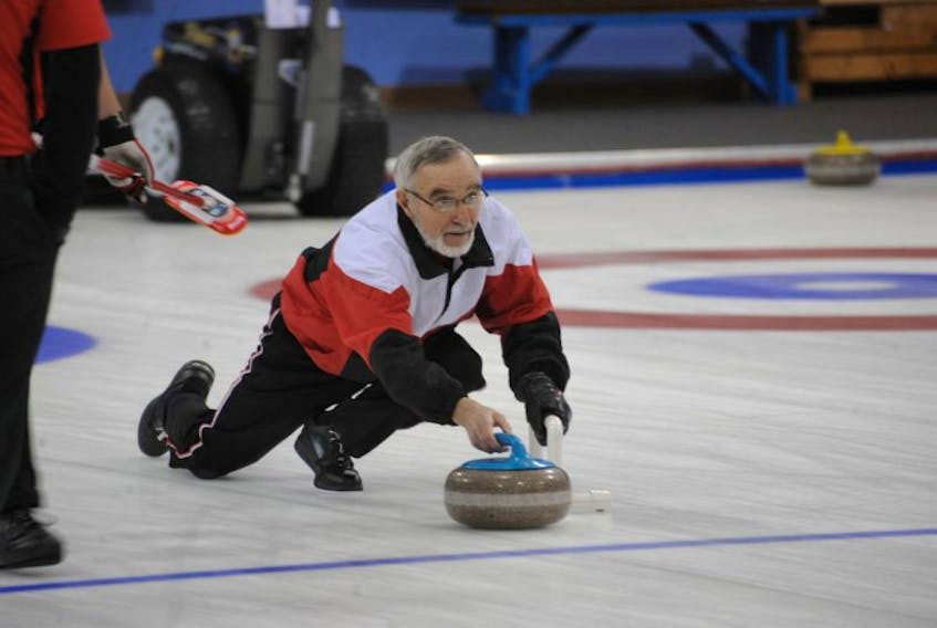 Skip Bas Buckle of Corner Brook delivers one of his two stones during third-end action against the Steve Routledge rink of St. John’s during opening day action in the men’s division of the Travelers Provincial Curling Club Championships at the Corner Brook Curling Club Friday.