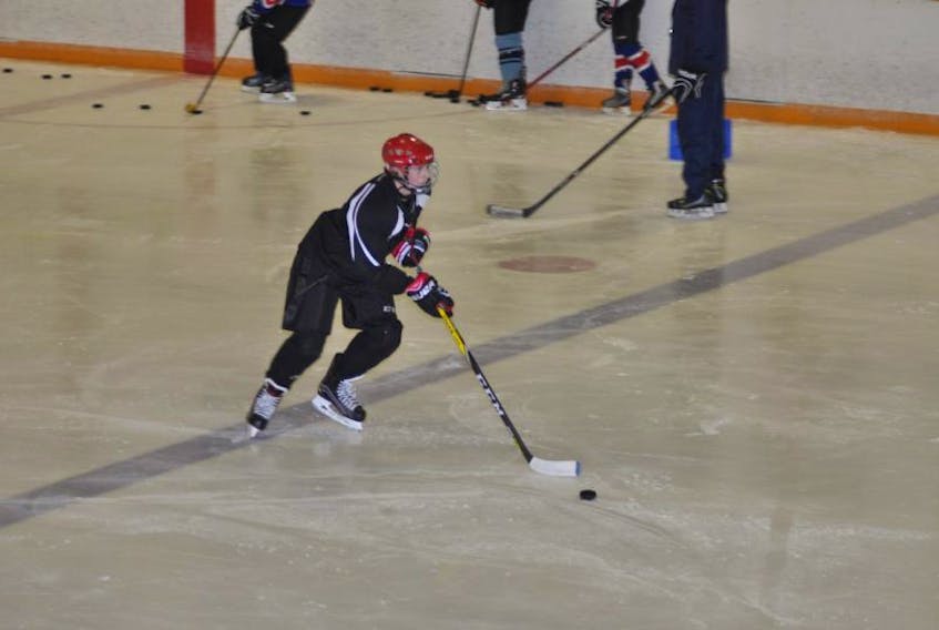 Here, 14-year-old Logan Hearns, of Corner Brook, participates in a drill during practice in the bantam division.