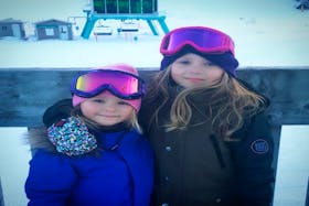 Andi Osmond (right) and her sister, Sadie, at Marble Mountain after a day of snowboarding at the ski resort earlier this season.
