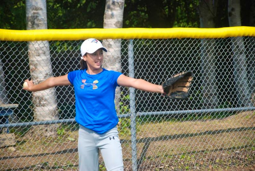 Katie Fisher of the Corner Brook Barons 14U female baseball team gets in a few tosses during a practice Tuesday at Little Jubilee Field in Corner Brook.