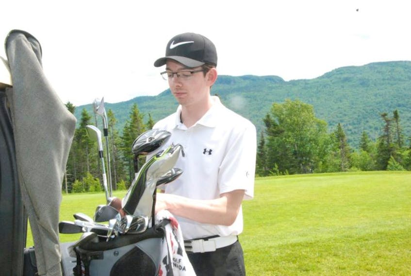 Corner Brook native Daniel Bruce gets ready for a round of golf at Humber Valley Resort earlier this week.