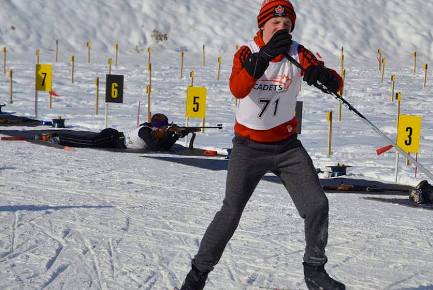 <p>Cadet Nathan Robichaud gets his poles on as he exits the range at Ski Martock during the Nova Scotia Cadet Biathlon Championships.<br /><em>Photo: Lieutenant Charles Huntley, Canadian Armed Forces</em></p>