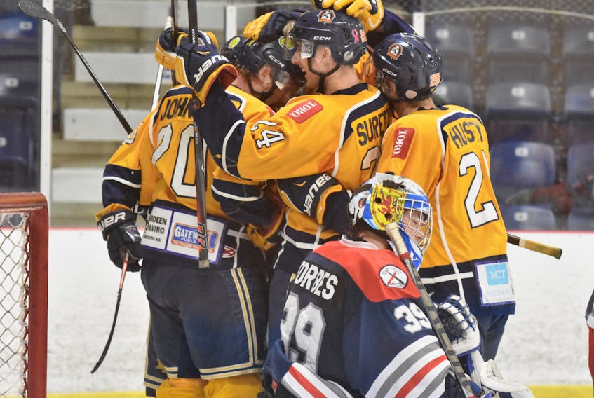 The Yarmouth Mariners celebrate a goal during a win against the South Shore Lumberjacks prior to the MHL's Christmas break. When the Mariners play again things will look different on the ice and the bench due to a flurry of trades and acquisitions. TINA COMEAU PHOTO • TRICOUNTY VANGUARD