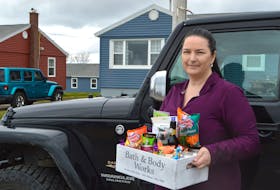 Amanda MacPherson of New Waterford delivered a wine fairy gift to a house near Lingan Road last week. The group provides the opportunity for participants to not only be gifted by a wine fairy but to become one themselves. Sharon Montgomery-Dupe/Cape Breton Post 