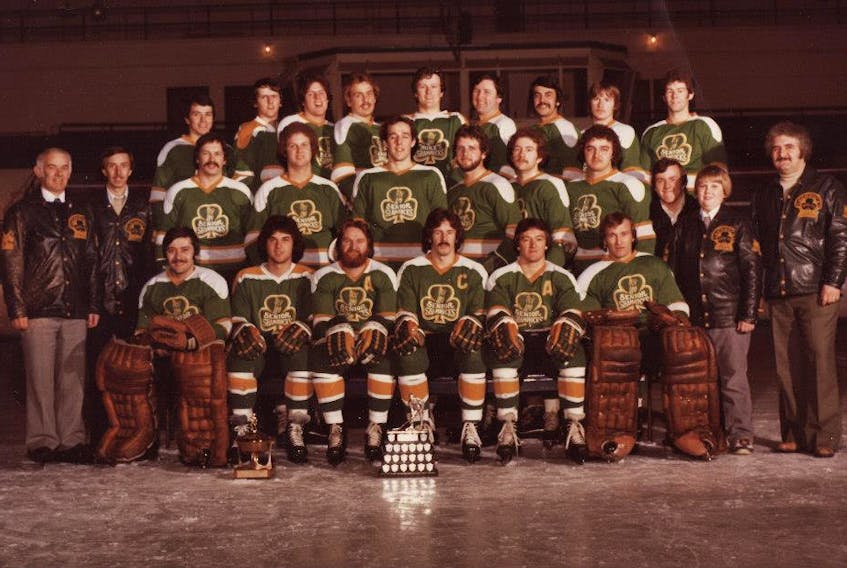 Members of Mike’s Shamrocks gathered for a team photo prior to their Allan Cup Canadian senior hockey championship against Petrolia, Ont., with their pickups from the BlueCaps (Randy Pearcey, Charlie Babstock and Jim Heale), after winning the 1979 Herder Memorial Trophy. Members of the team were (from left, first row Fred Burke, John Breen, Gary Connolly, Nigel Facey, Max Hayes, Junior Hammond; (second row): coach Jim “Aucker” Byrne, public relations director Ed Durdle, John Byrne, Bill Breen, Bob O’Neil, Ron Cadigan, Paul Norman, Grant McDougall, trainer Dave Corrigan, stickboy Peter Byrne, owner/general manager Mike Squires; “Back row”: Randy Pearcey, Charlie Babstock, Bill Perry, Mark Idler, Jim Heale, Hubert Hutton, Gary Noftle, John Hearn and Jerry Power. - CONTRIBUTED VIA FACEBOOK