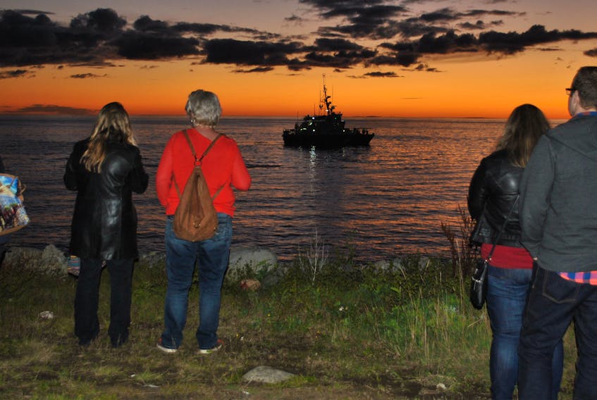 UFO festival goers line the shoreline at the impact site to watch a re-enactment involving the Canadian Coast Guard lifeboat Clark’s Harbour and the RCMP during the 50th anniversary festival in 2017. A similar re-enactment is planned for this year’s festival, scheduled for Oct. 4 to 6.