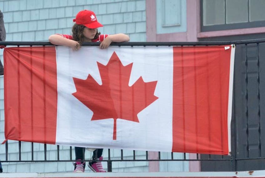 ['Lots of maple leafs and flags of all sizes were abundant on Canada Day in Yarmouth.']