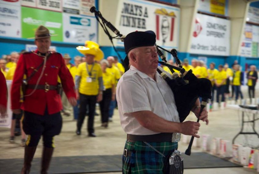 A piper leads Digby’s cancer survivors as they walk the first lap of the night June 24 at Relay For Life.