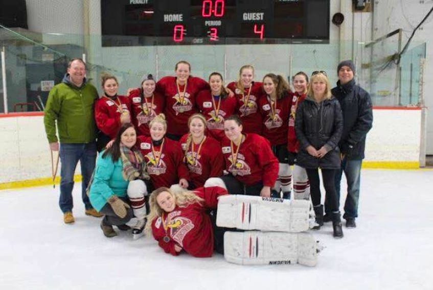 With just 10 skaters and one goalie, the Yarmouth Vikings high school hockey team came away with a tournament win at a recent event in Middleton. Picture are (back row) head coach Roy Hamilton, Carlie Jeffery, Kenzie Muise, Hallie Moore, Katherine Kini, Saige Breton, Grace Hobbs, Caileigh White, team manager Shiella Legere, assistant coach Paul Legere, (middle row) assistant coach Brooke Hamilton, Meggie O’Brien, Laura Legere, Olivia Erye and (front) Lindsey Minard.