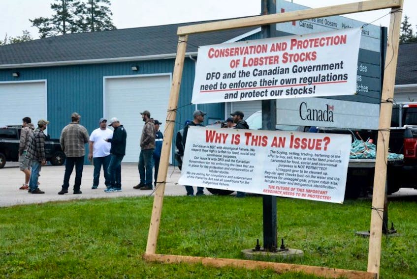 Fishermen gathered in a parking lot at the Department of Fisheries and Oceans detachment in Tusket, Yarmouth County, on Sept. 14. They have expressed concerns that there is illegal commercial fishing happening over the summer and fall months and DFO isn't doing enough to prevent or enforce.