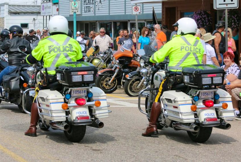 Two RCMP motorcycle units on patrol during a previous Wharf Rat Rally.