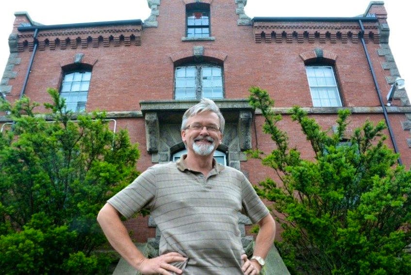 David Sollows stands in front of the old Yarmouth jail, which is believed to be haunted. He says there are many ghostly tales in Yarmouth’s past.