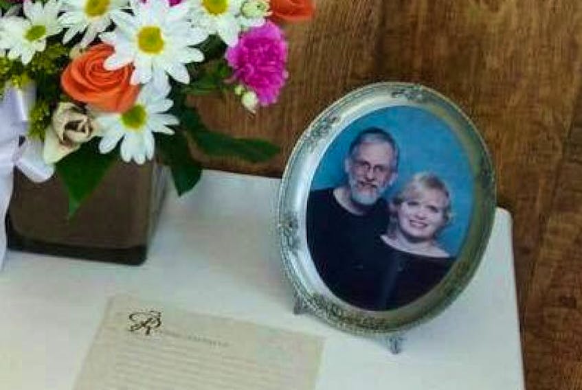 A photo of Dave and Marilyn Taylor on display at her funeral service. "She was the love of my life," says Dave. "“I’m going to keep going, because that’s what she would do."