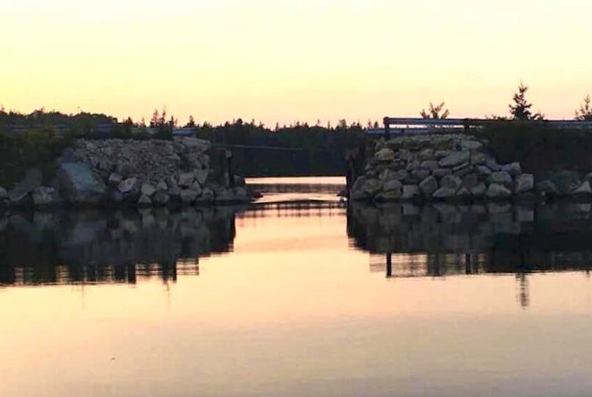 In a picture from Sept. 12, the site of the Eel Lake bridge in Yarmouth County is shown, after the 50-year-old bridge had been removed. An overhaul of the bridge is slated to be finished by the end of October, the province says.